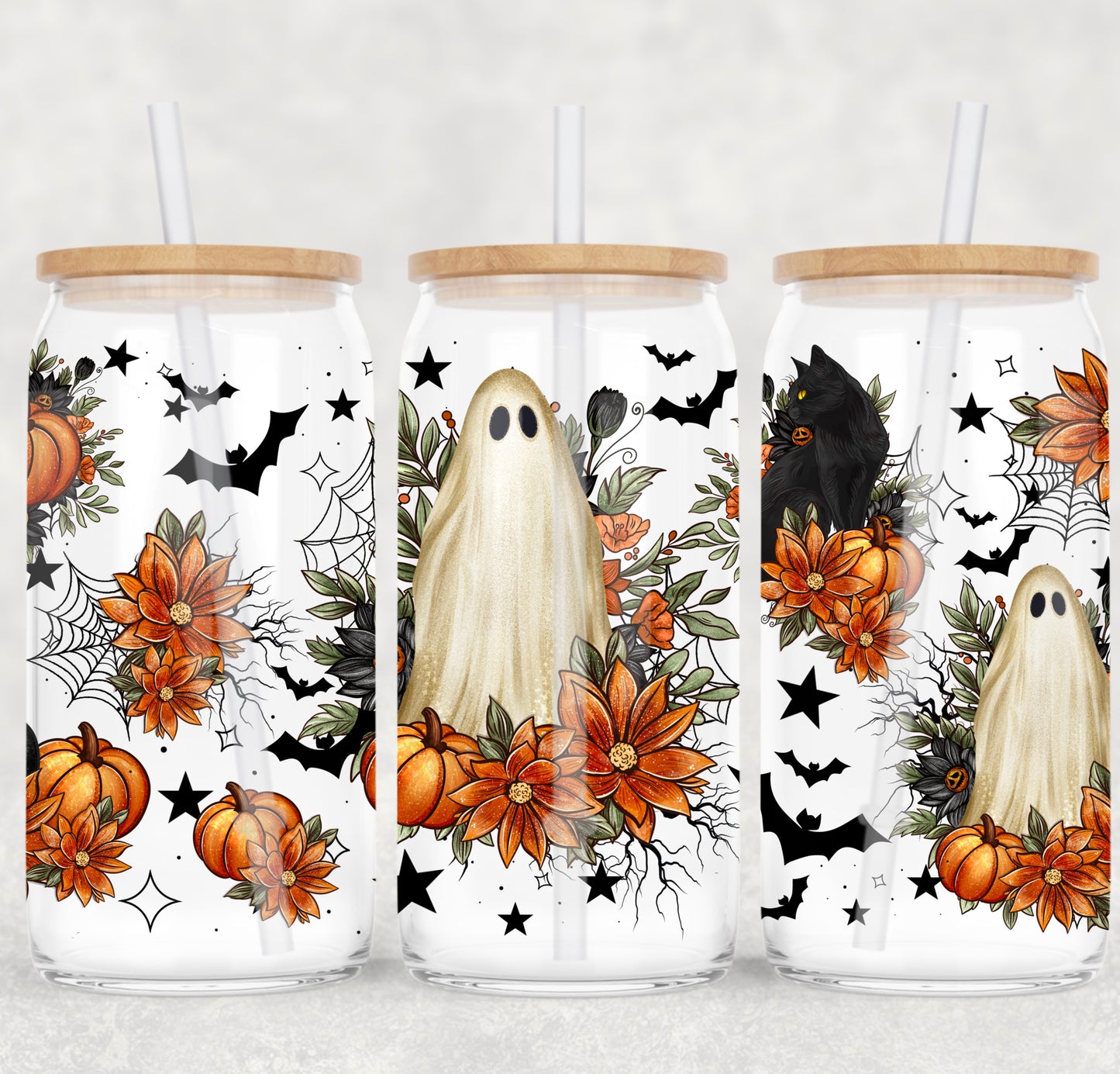 Three glass jars with Halloween-themed designs featuring ghosts, pumpkins, and bats on a white background.
