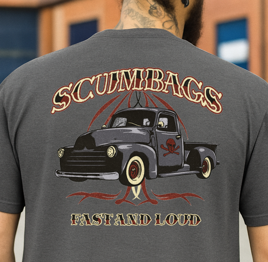 Person wearing a gray t-shirt with a graphic design of a truck and text on the back.