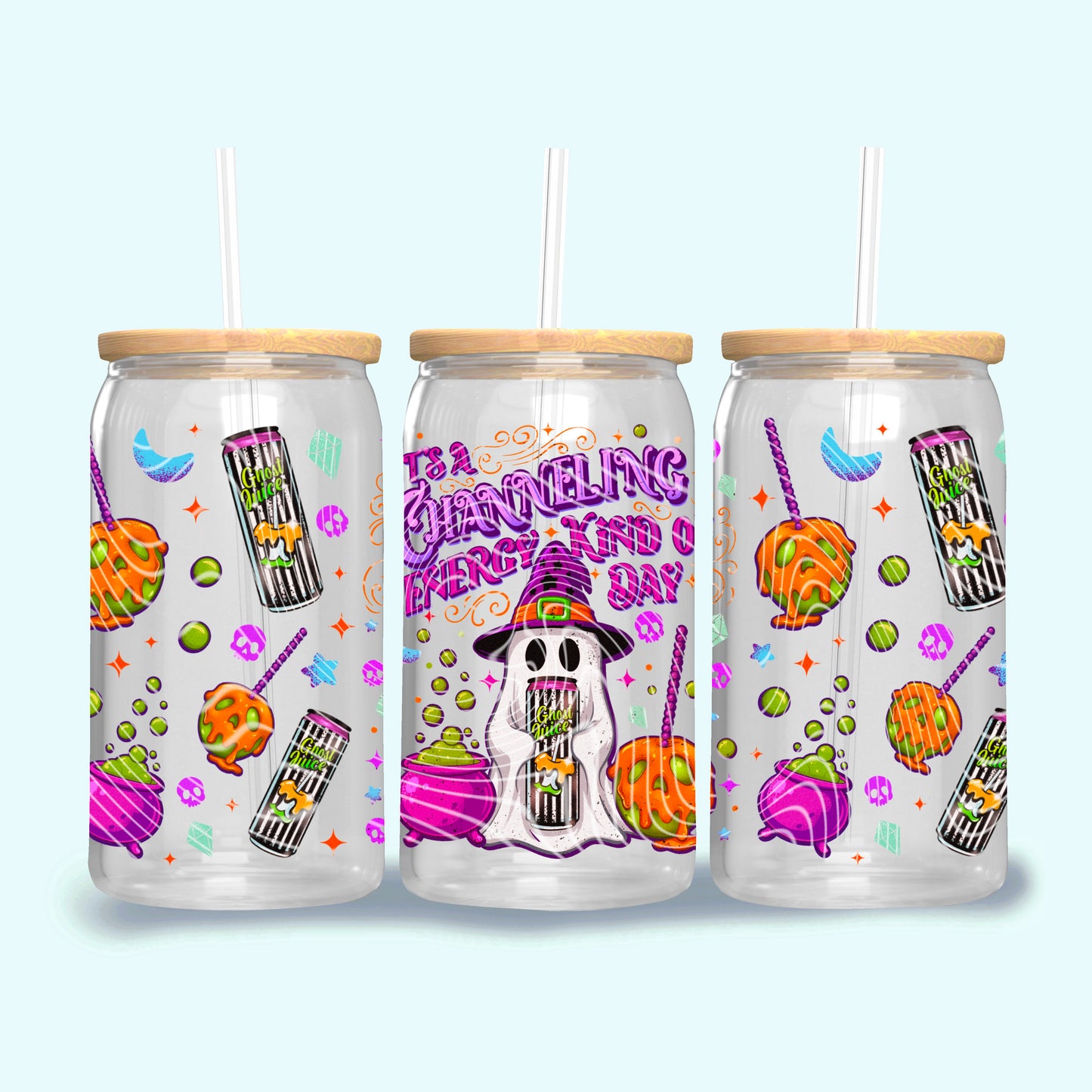 Three colorful Halloween-themed tumblers with straw lids on a light blue background