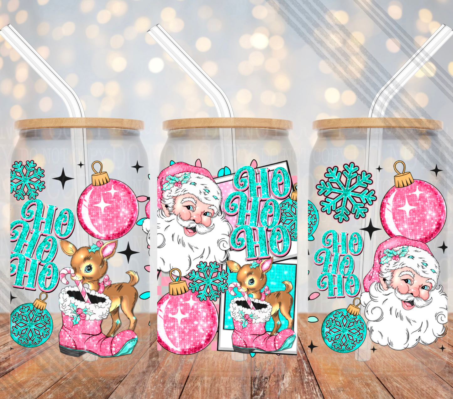 Three glass tumblers with Christmas-themed designs featuring Santa Claus, reindeer, and ornaments on a wooden surface.