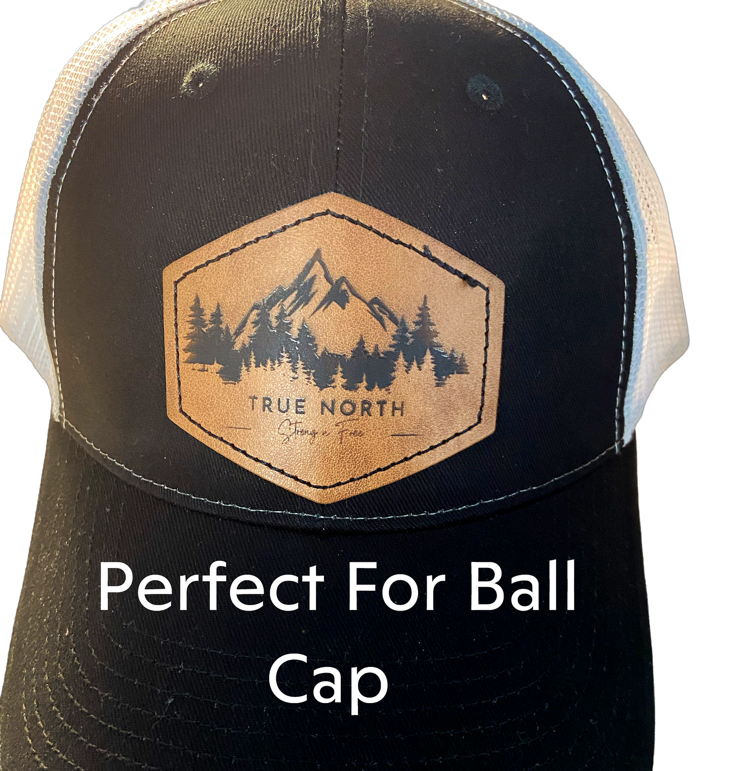 a black and white hat with a brown patch on it