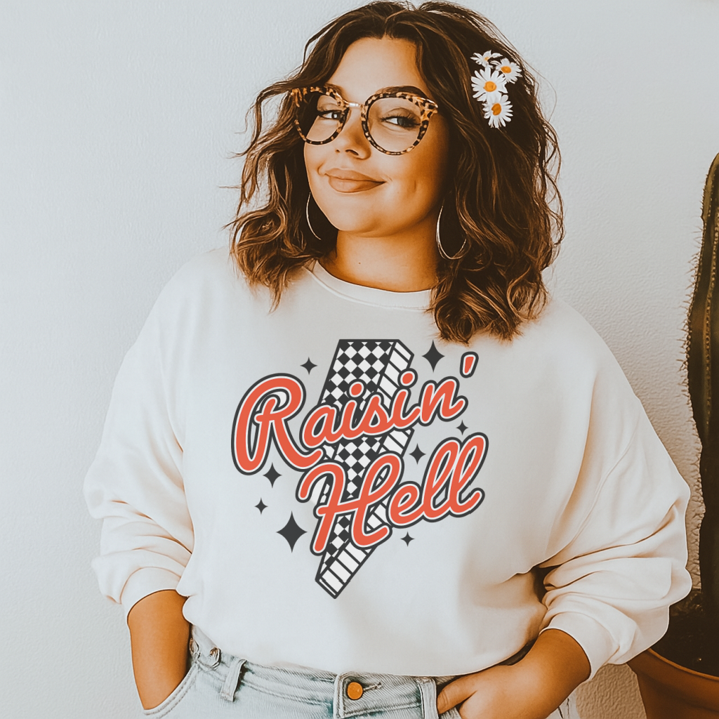 DTF Transfer Raisin’ Hell – Retro Red Script with Checker Lightning Bolt & Star Accents