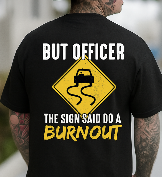 Person wearing a black t-shirt with a humorous graphic and text on the back.