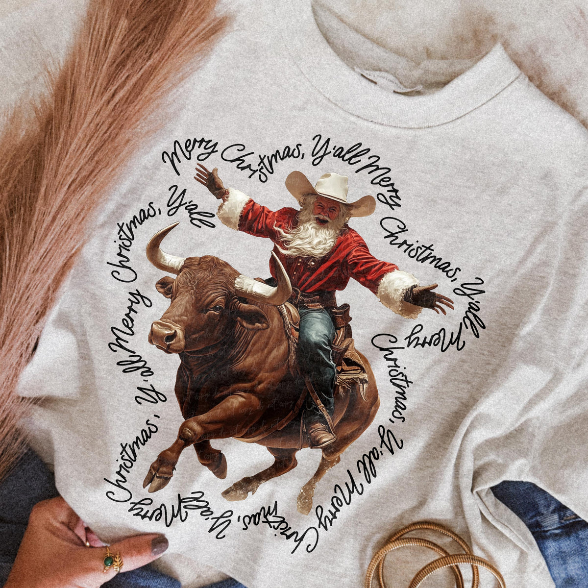 Merry Christmas Y'all – Cowboy Santa on a Bull printed garment design preview