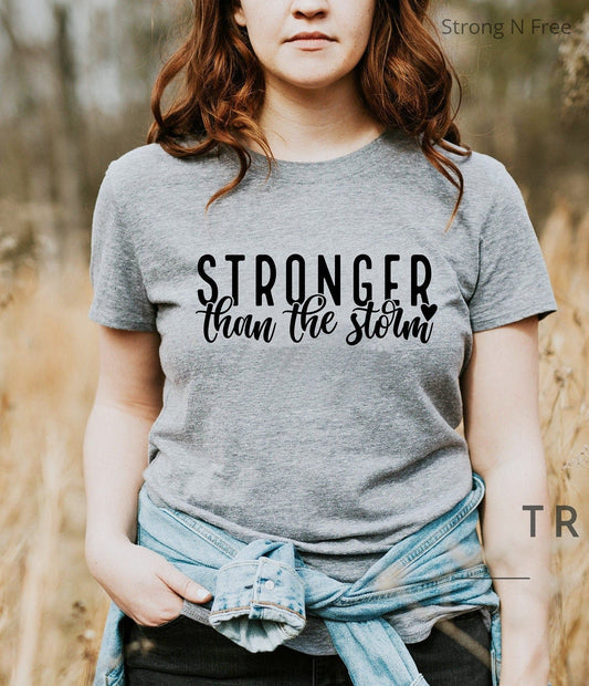 Stronger Than the Storm Empowered Womens Christian T-Shirt .