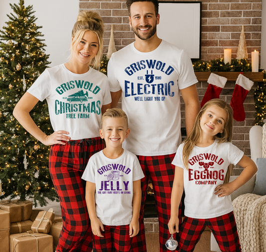 Family of four wearing matching Christmas-themed t-shirts and plaid pants in a festive living room.