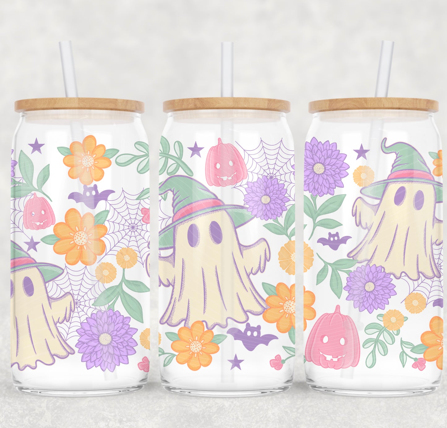 Three glass jars with Halloween-themed designs featuring ghosts, pumpkins, and flowers on a white background.
