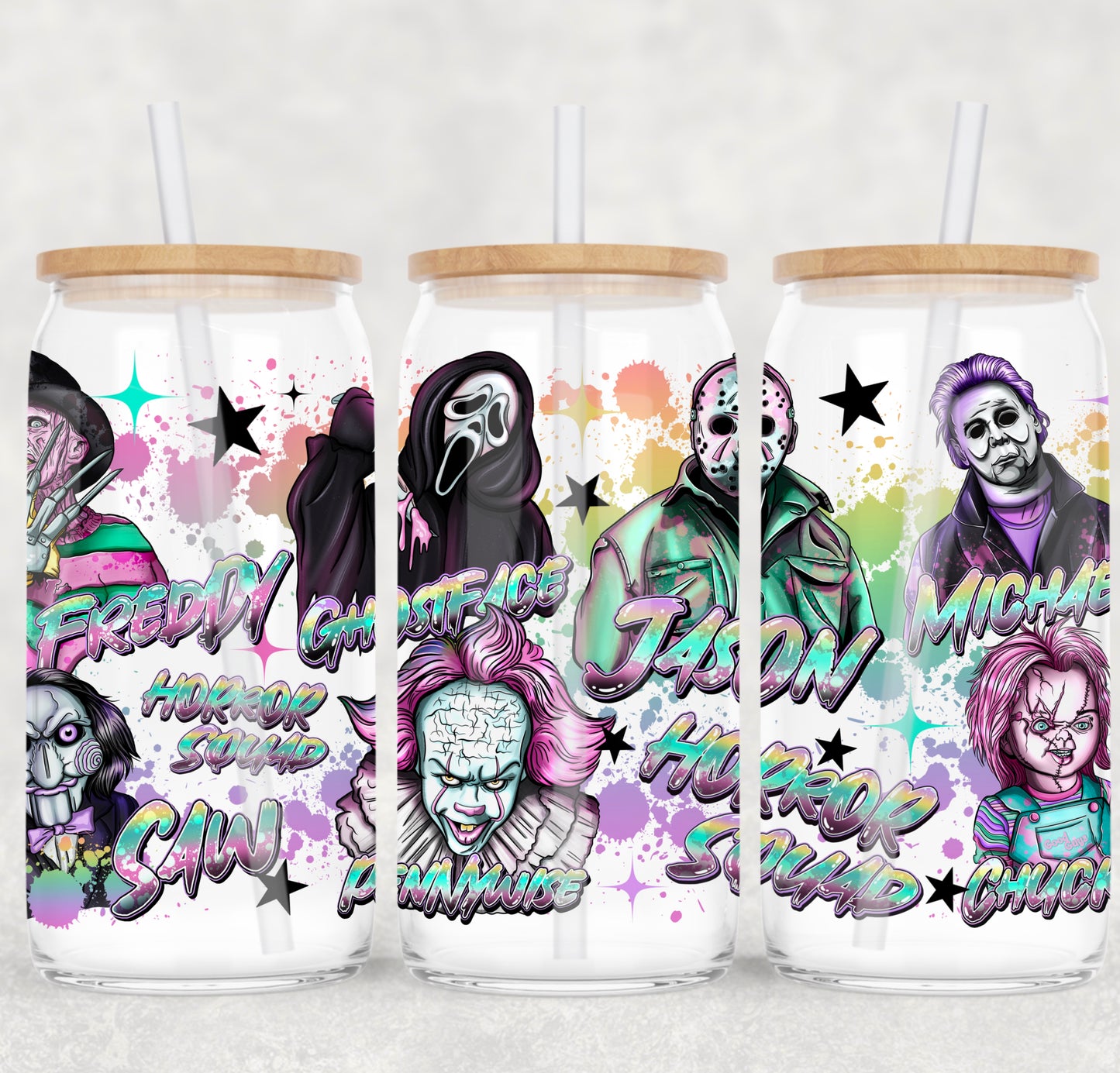 Three glass tumblers with character designs and text on a white background