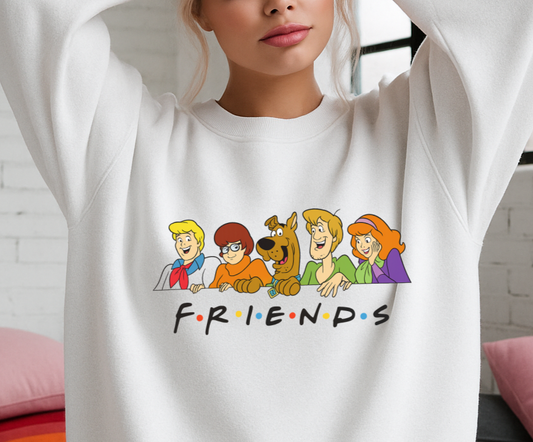 Person wearing a white sweatshirt with cartoon character design and 'Friends' text.