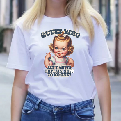 a woman wearing a white t - shirt with a picture of a baby on it