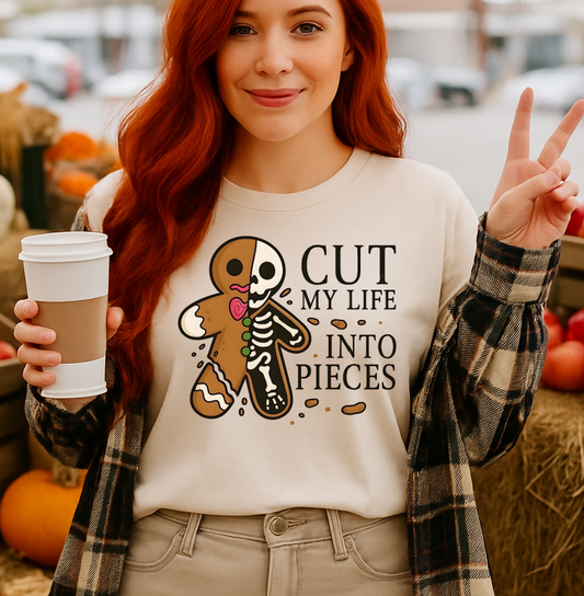 Woman with red hair holding a coffee cup in an outdoor market setting with pumpkins and apples.