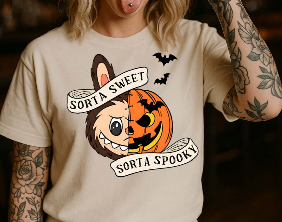 Person wearing a Halloween-themed t-shirt and black cap with 'Racing' text, standing in a dimly lit bar.