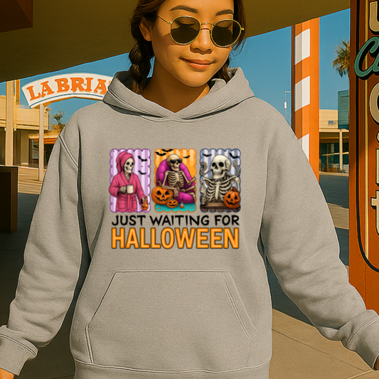 Woman wearing a hoodie with Halloween-themed design in front of a store entrance.