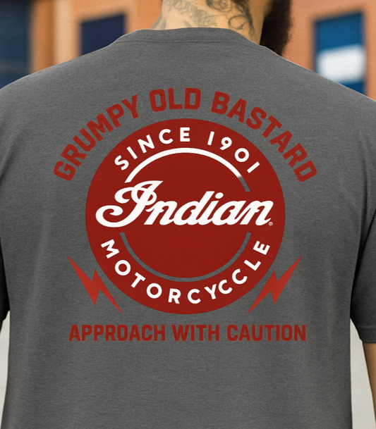 Person wearing a gray t-shirt with Indian Motorcycle logo on the back