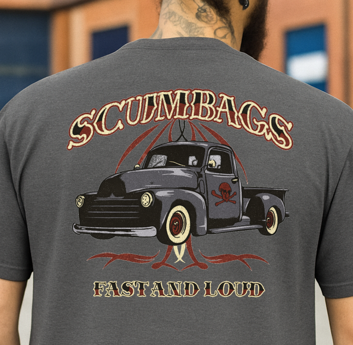 Person wearing a gray t-shirt with a graphic design of a truck and text on the back.