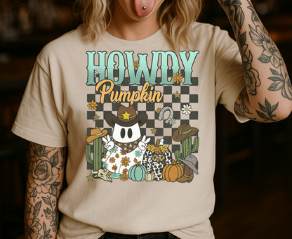 Person wearing a 'Howdy Pumpkin' t-shirt and black cap with 'Racing' text, standing in a dimly lit bar.