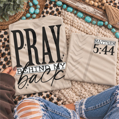 Pray Behind My Back – Matthew 5:44 – garment mockup showing the transfer design; garment not included