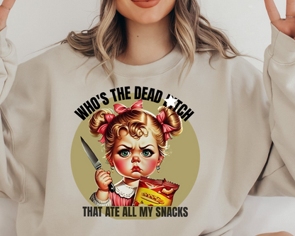 a woman wearing a sweatshirt that says who's the dead tooth that ate all