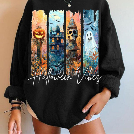 Black sweatshirt with Halloween-themed design and 'Halloween Vibes' text on a neutral background