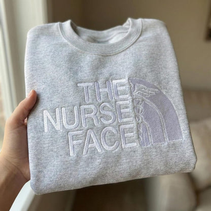Embroidered “The Nurse Face” Cozy Crewneck