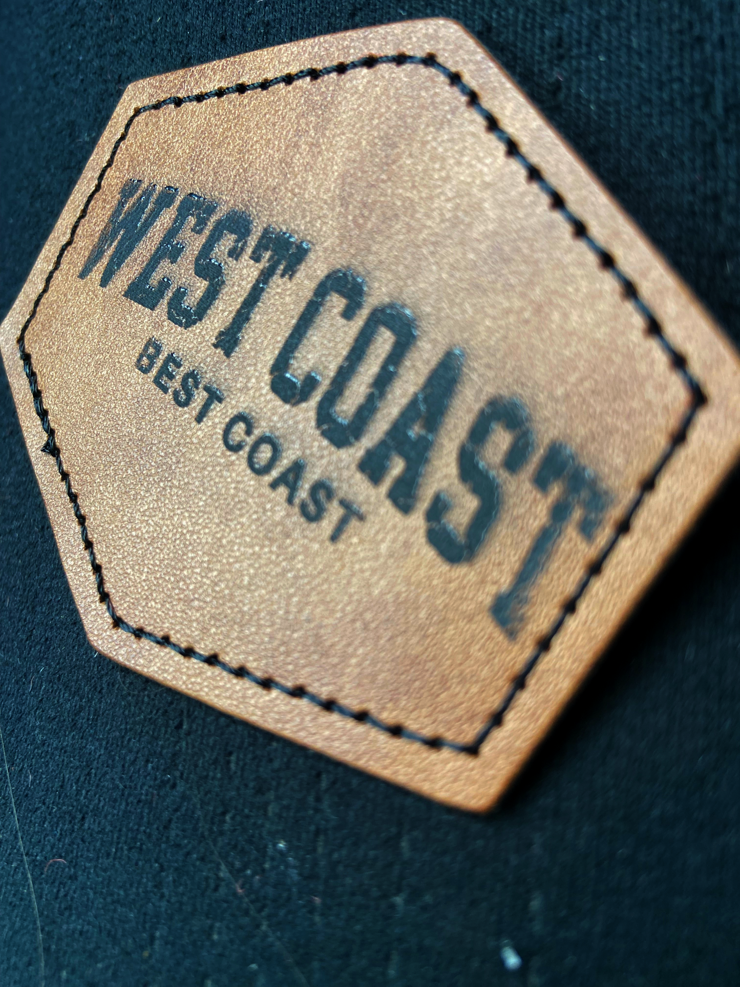 a leather label that says west coast best coast