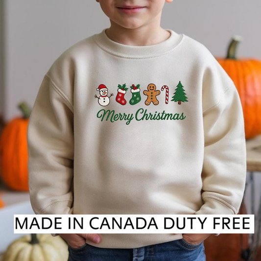 A child wearing a white sweater with a Christmas-themed design, including a snowman, gingerbread man, stockings, and a Christmas tree.