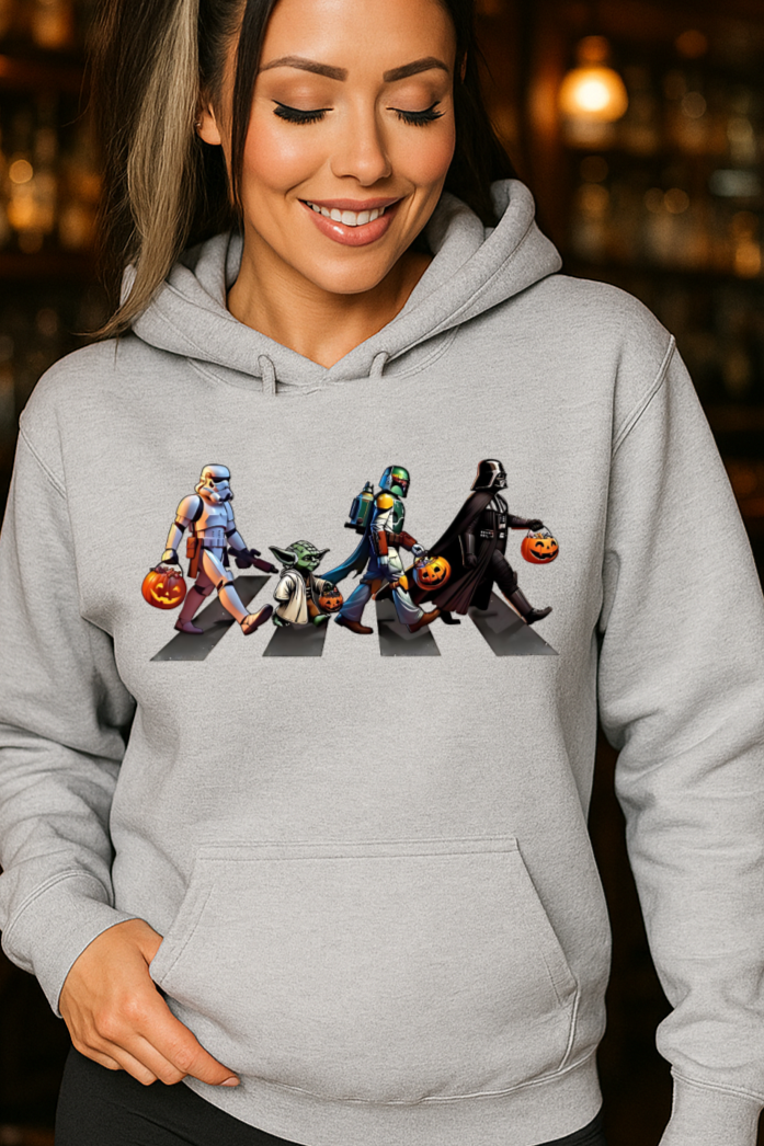 Woman wearing a hoodie with a unique design in a bar setting