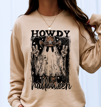 Beige sweatshirt with 'Howdy Halloween' graphic design worn by a person.