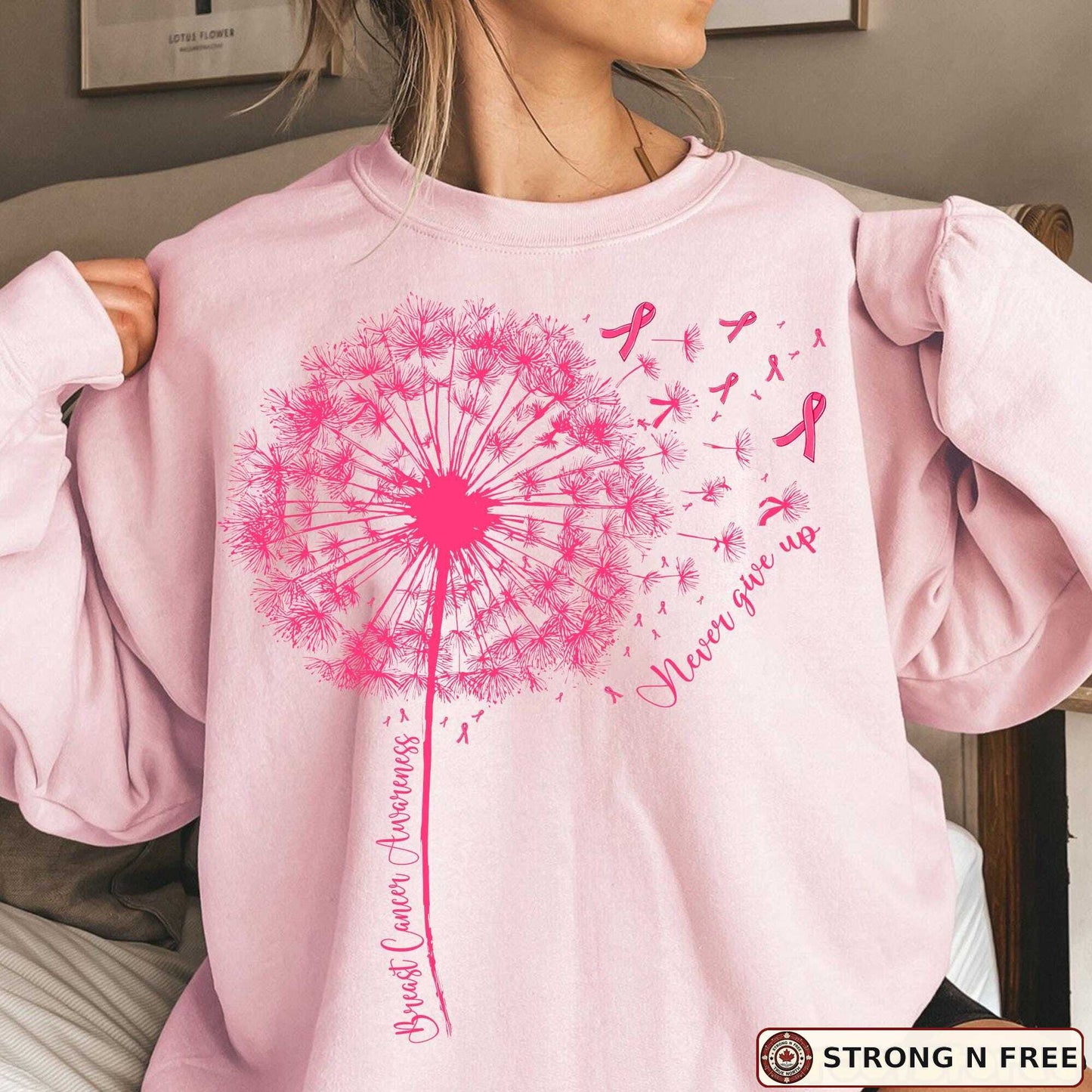 Dandelion breast cancer awareness DTF transfer on a pink sweatshirt