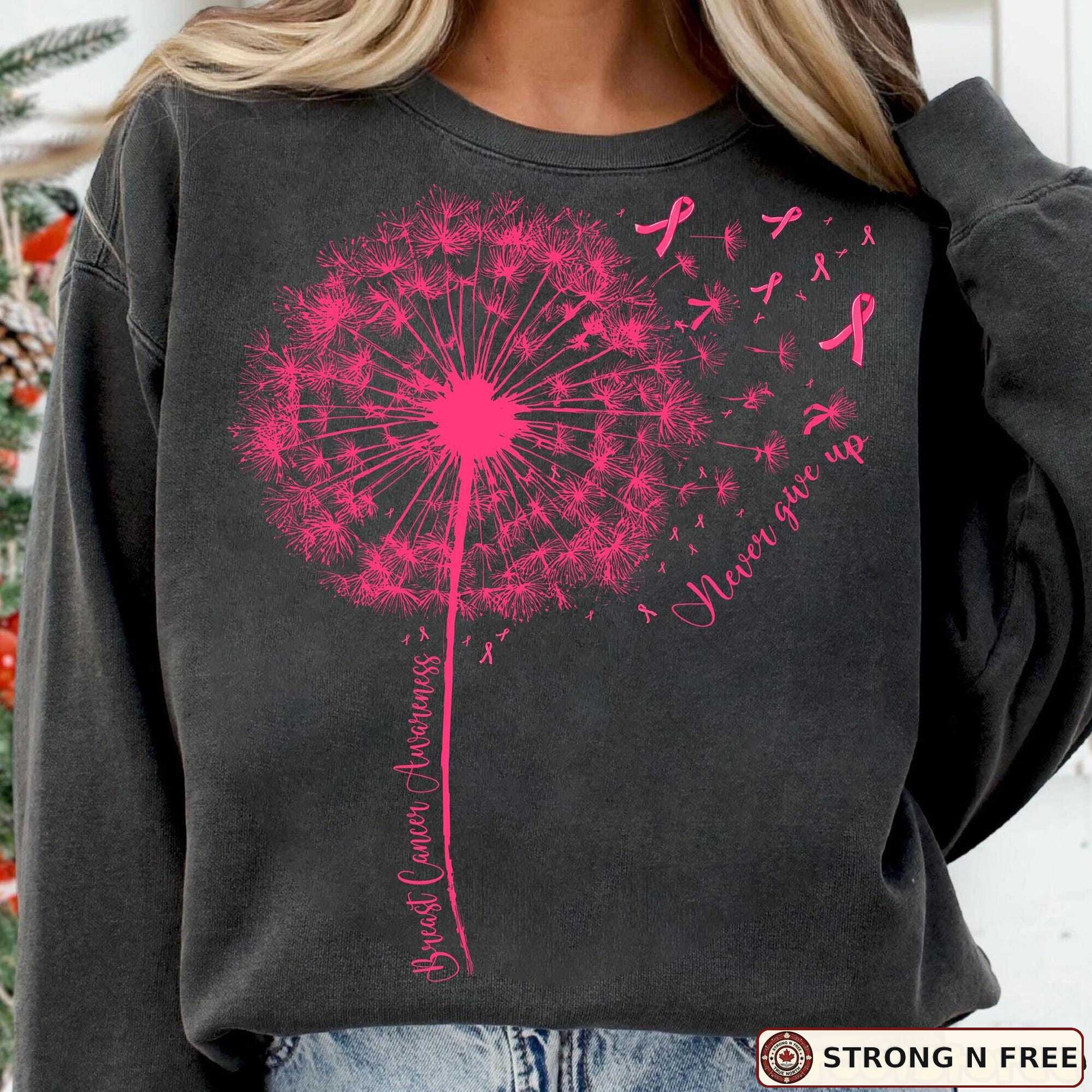 Dandelion breast cancer awareness DTF transfer on a charcoal sweatshirt