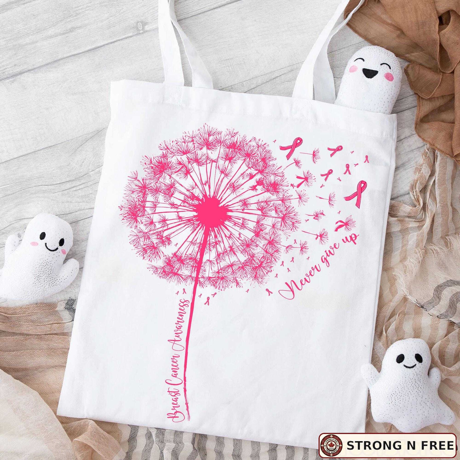 Dandelion breast cancer awareness DTF transfer on a white tote bag