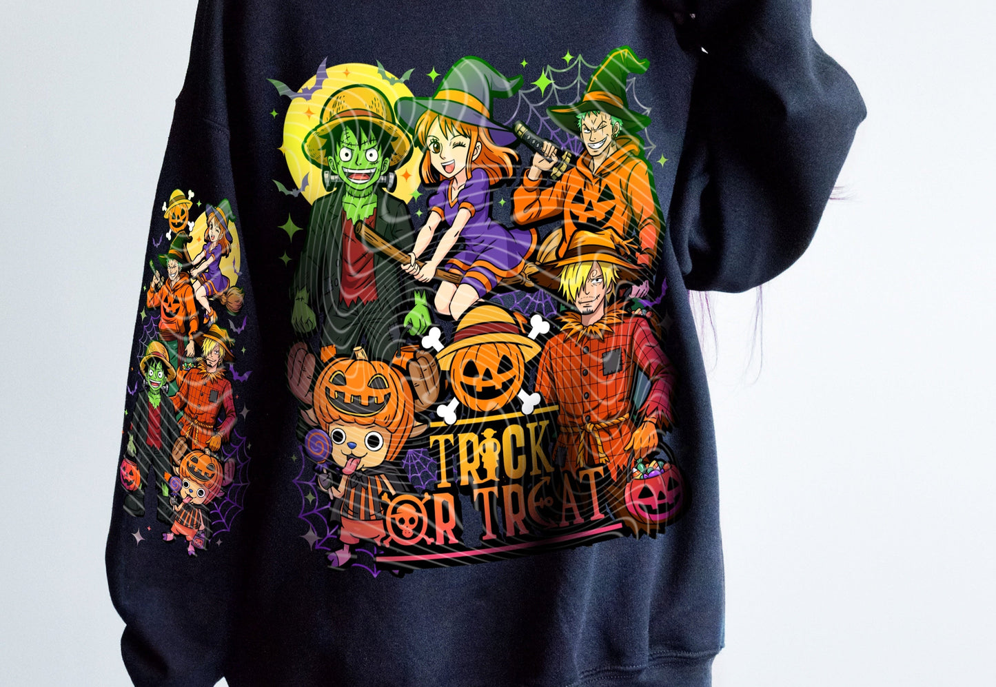 Black sweatshirt with Halloween-themed design featuring characters and 'Trick or Treat' text.