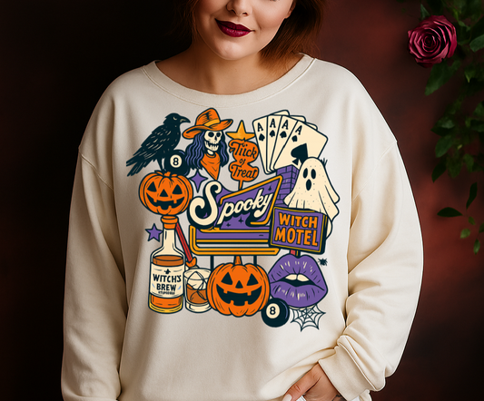 Woman wearing a Halloween-themed sweatshirt with graphics on a dark background