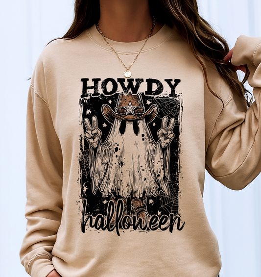 Beige sweatshirt with 'Howdy Halloween' graphic design worn by a person.
