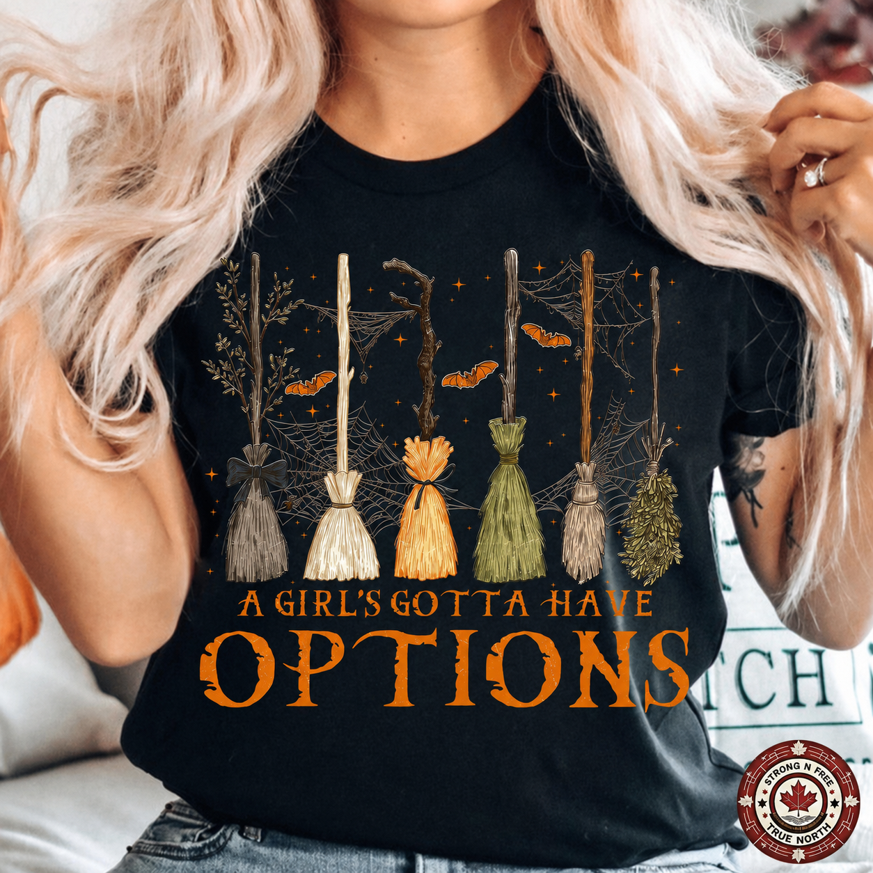 A Girl's Gotta Have Options DTF transfer on a black T-shirt