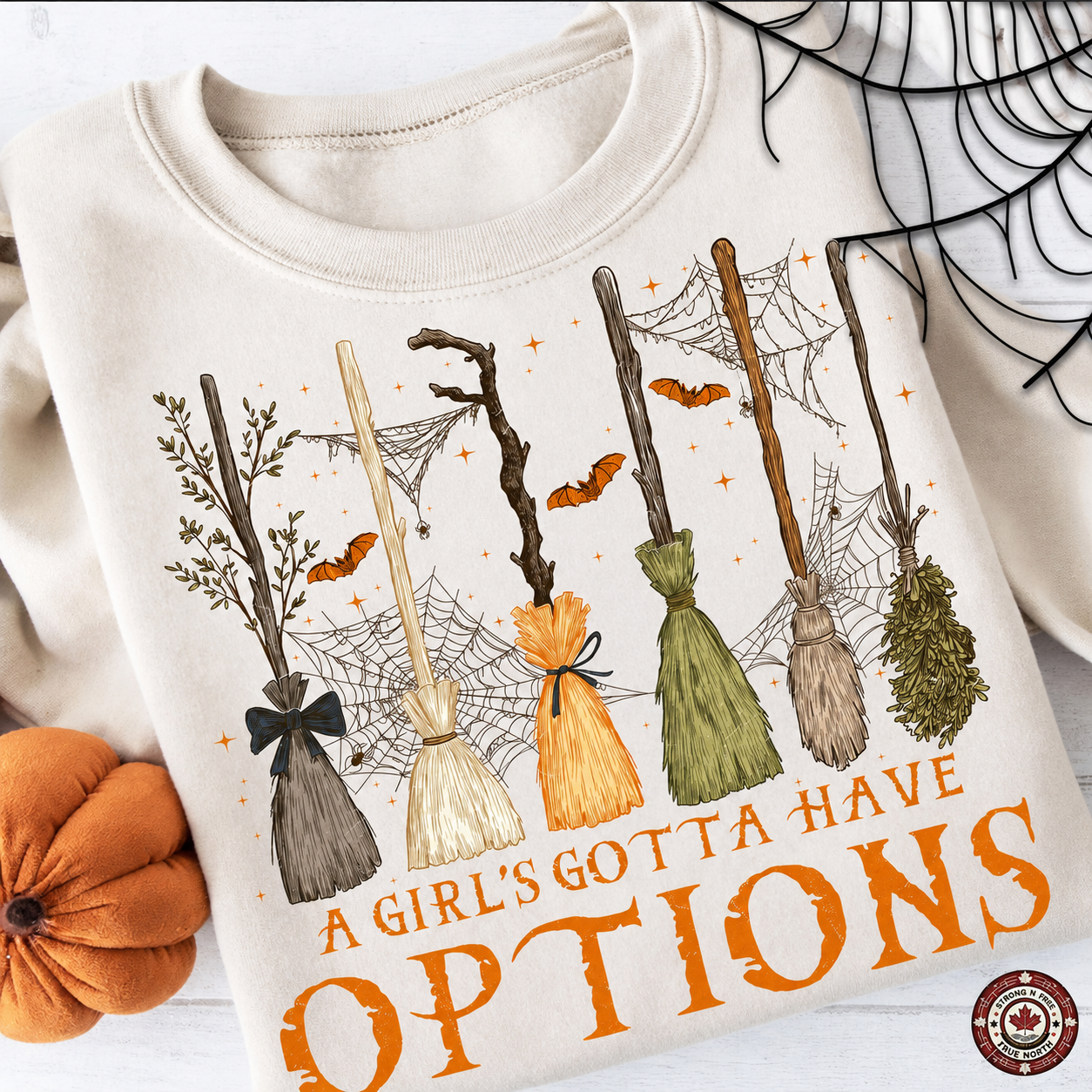 A Girl's Gotta Have Options DTF transfer on a cream sweatshirt