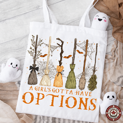A Girl's Gotta Have Options DTF transfer on a tote bag