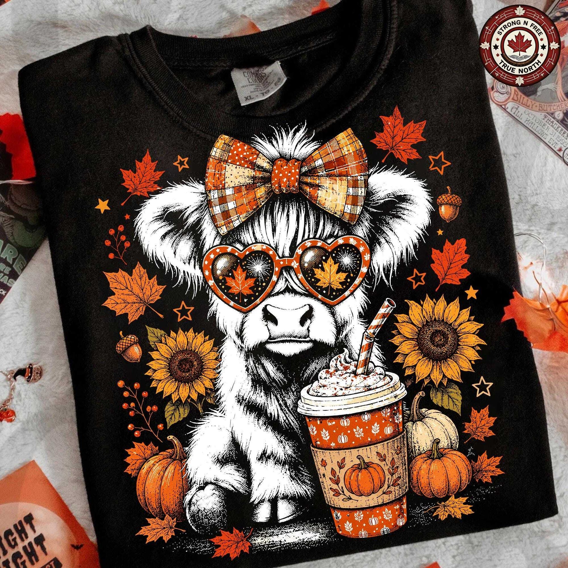 Retro Highland cow autumn DTF transfer on a black T-shirt