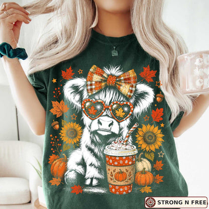 Retro Highland cow autumn DTF transfer on a green T-shirt