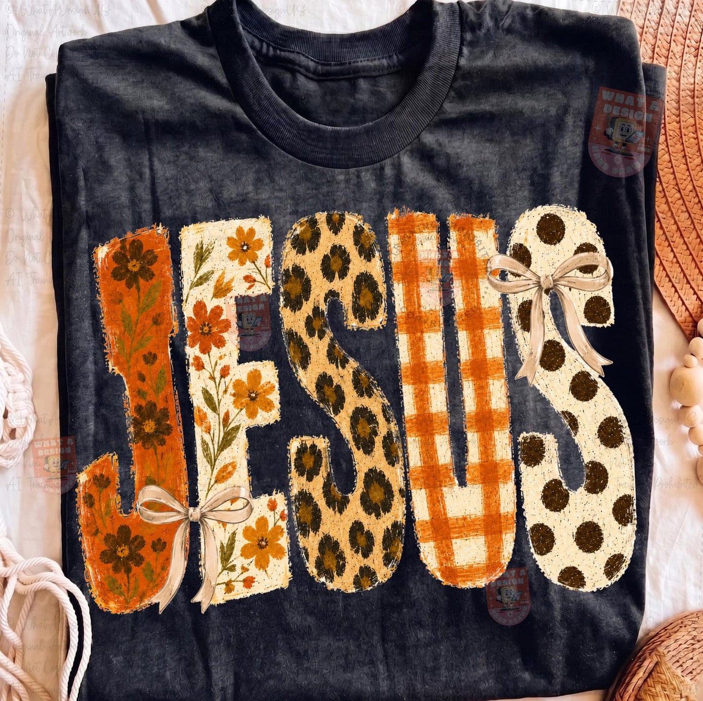 Jesus fall patterned-letter DTF transfer shown on a black T-shirt