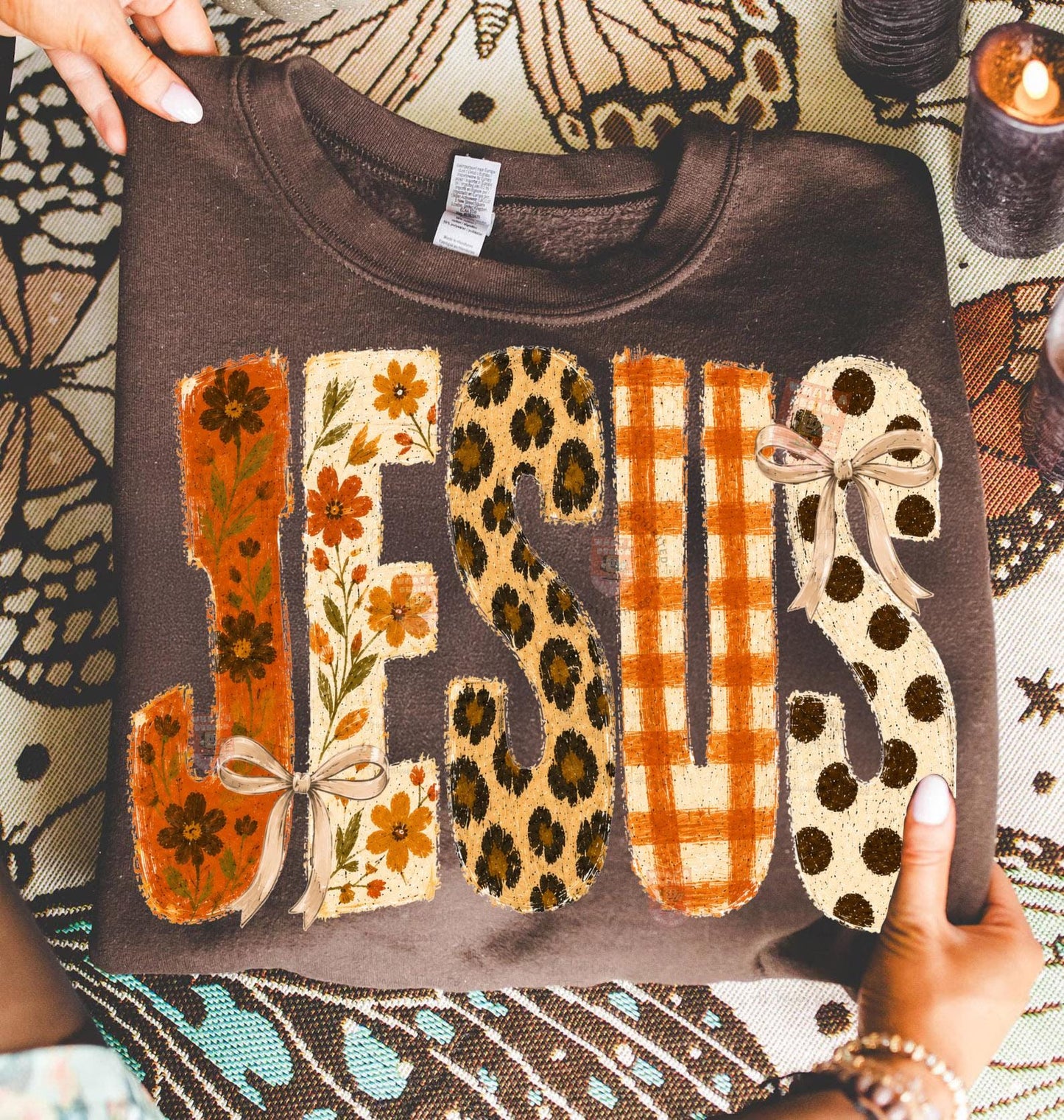Jesus autumn DTF transfer shown on a brown sweatshirt