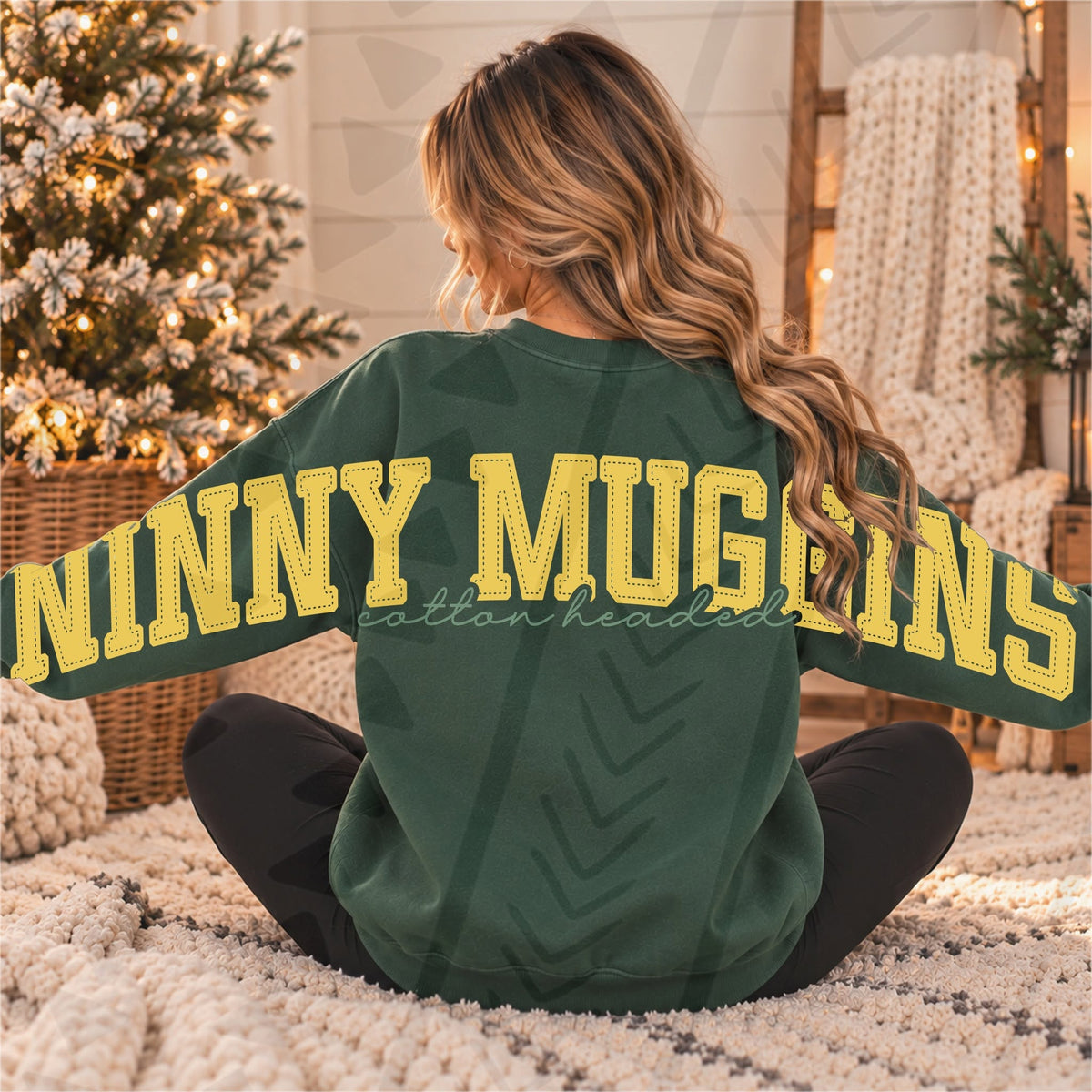 Yellow NINNY MUGGINS varsity lettering with green cotton headed script shown across the back and sleeves of a green sweatshirt; DTF transfer only, garment not included.