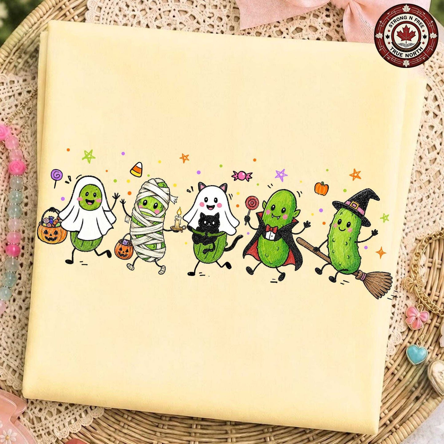 Funny Halloween pickle characters DTF transfer on a pale yellow garment