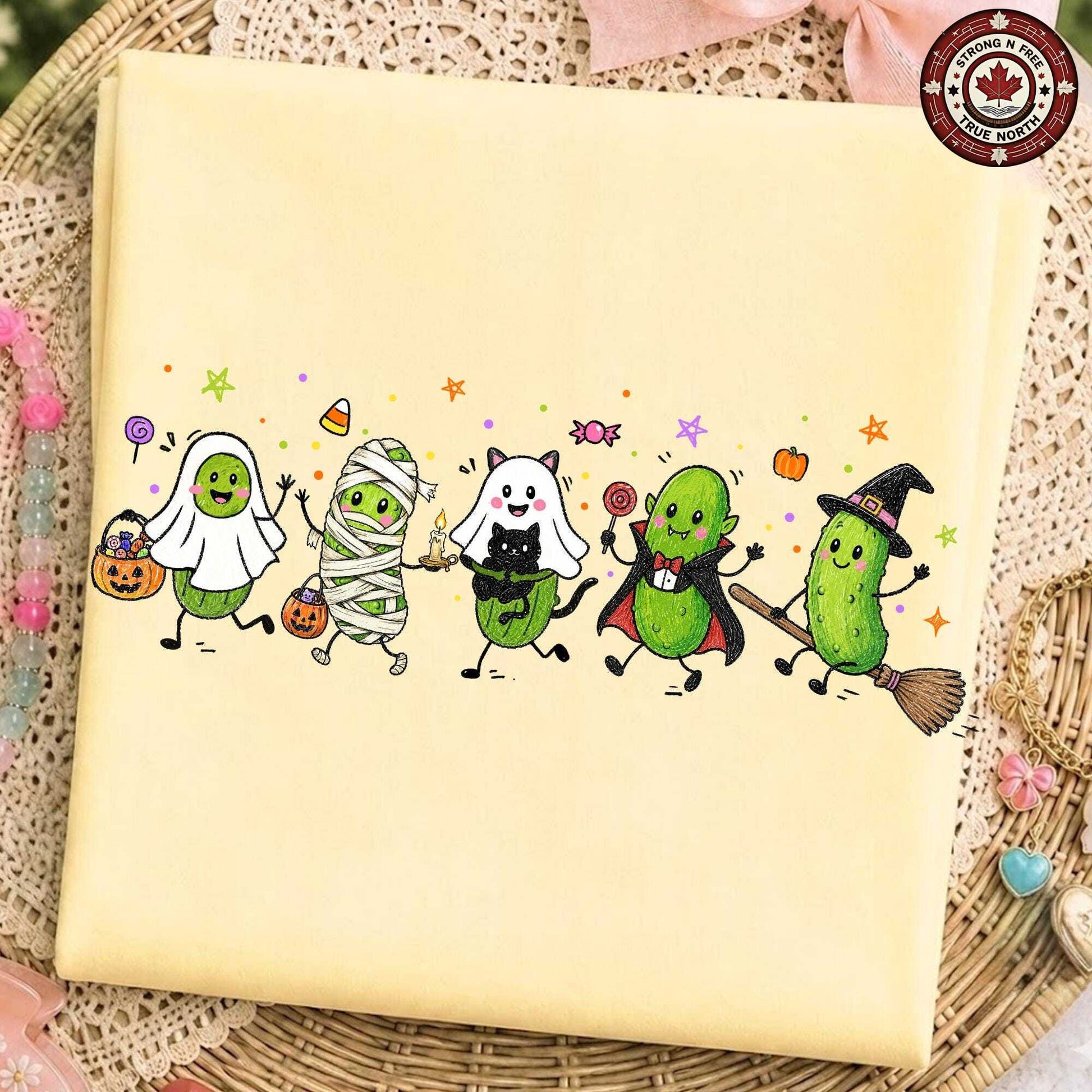 Funny Halloween pickle characters DTF transfer on a pale yellow garment