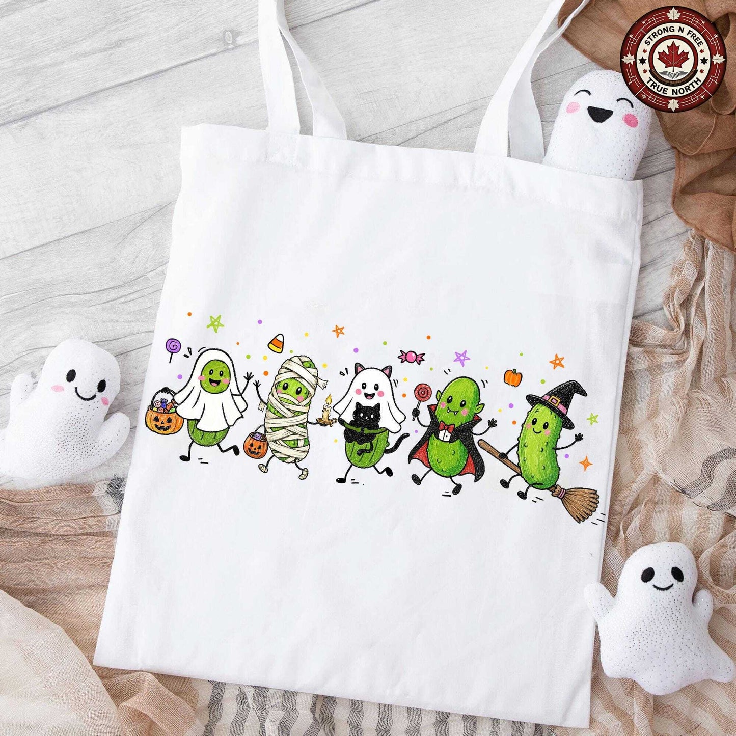 Funny Halloween pickle characters DTF transfer on a white tote bag