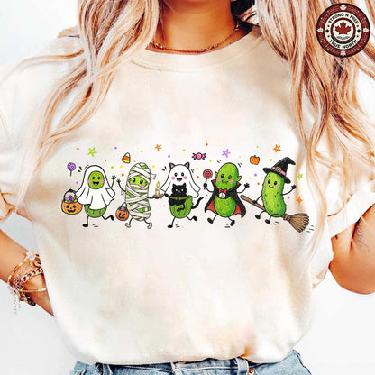 Funny Halloween pickle characters DTF transfer on a cream T-shirt