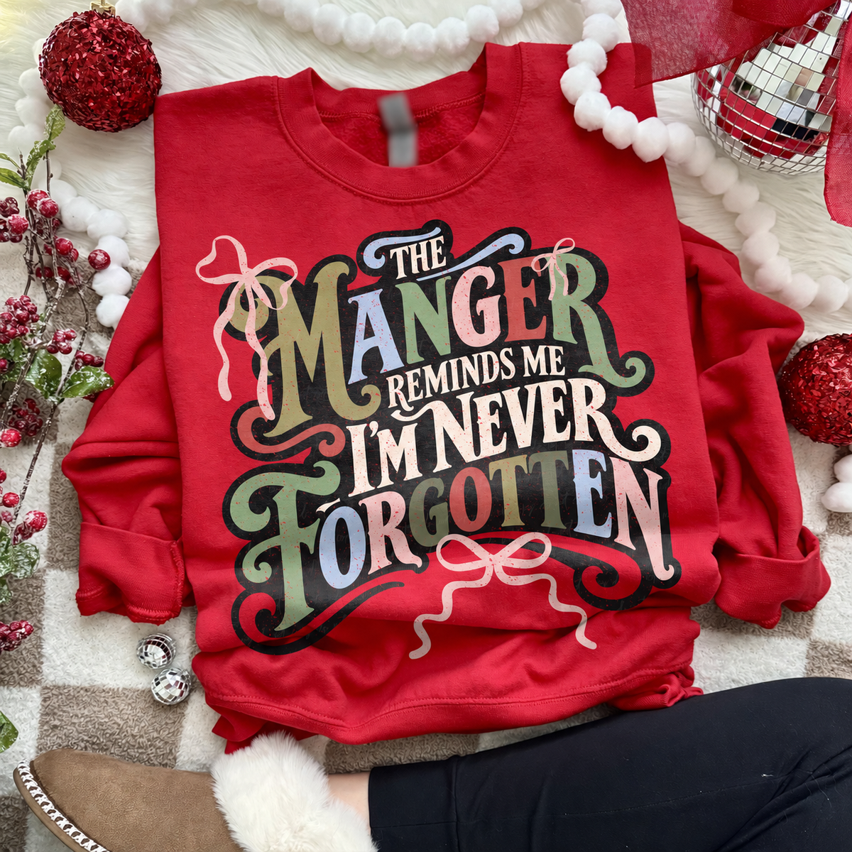 The Manger Reminds Me I'm Never Forgotten printed garment design preview