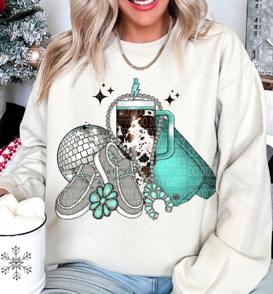 Disco Ball, Teal Bag, Cow Print Tumbler and Sneakers DTF transfer shown on a garment