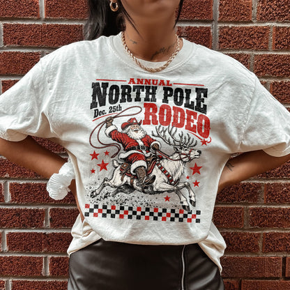 North Pole Rodeo – Santa Riding a Reindeer printed garment design preview