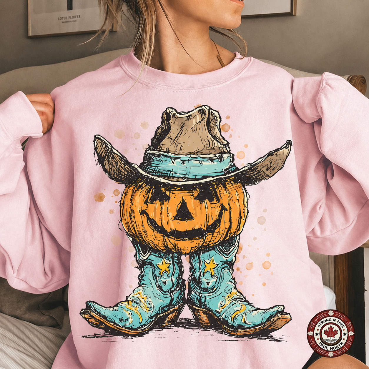Western Pumpkin Cowboy Boots DTF transfer on a pink sweatshirt